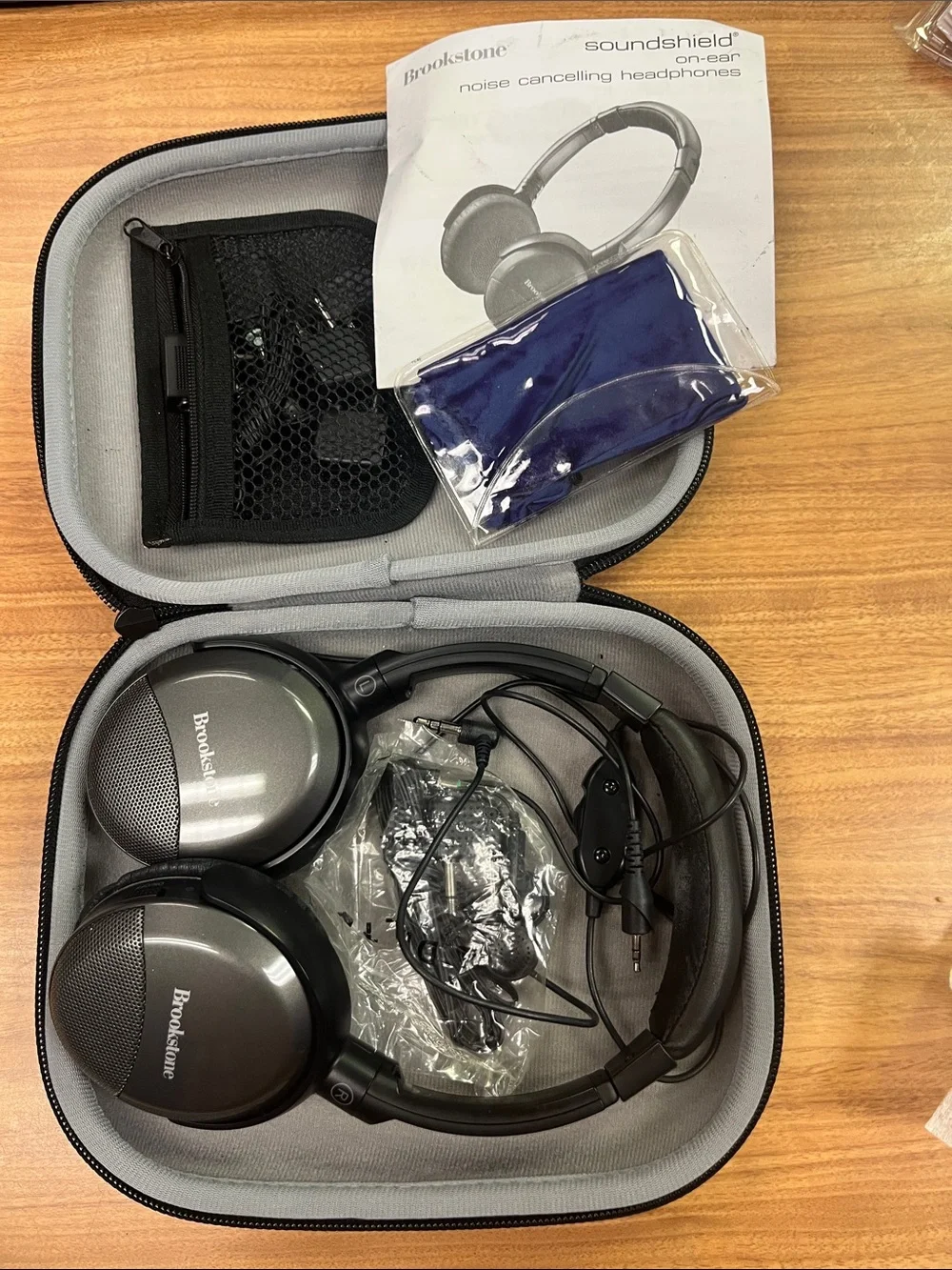Brookstone Silver and Black On-Ear Noise-Cancelling Headphones with Case